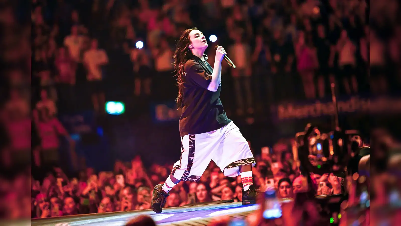 Billie Eilish performing live 2025
